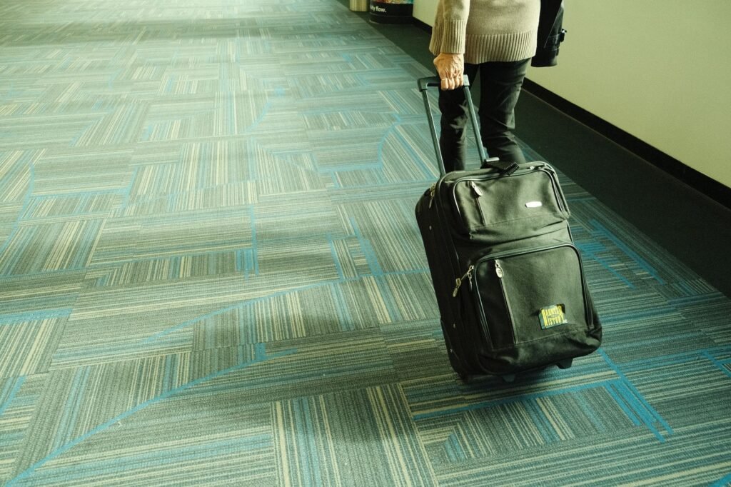 Traveller with a suitcase ready to travel after medical clearance